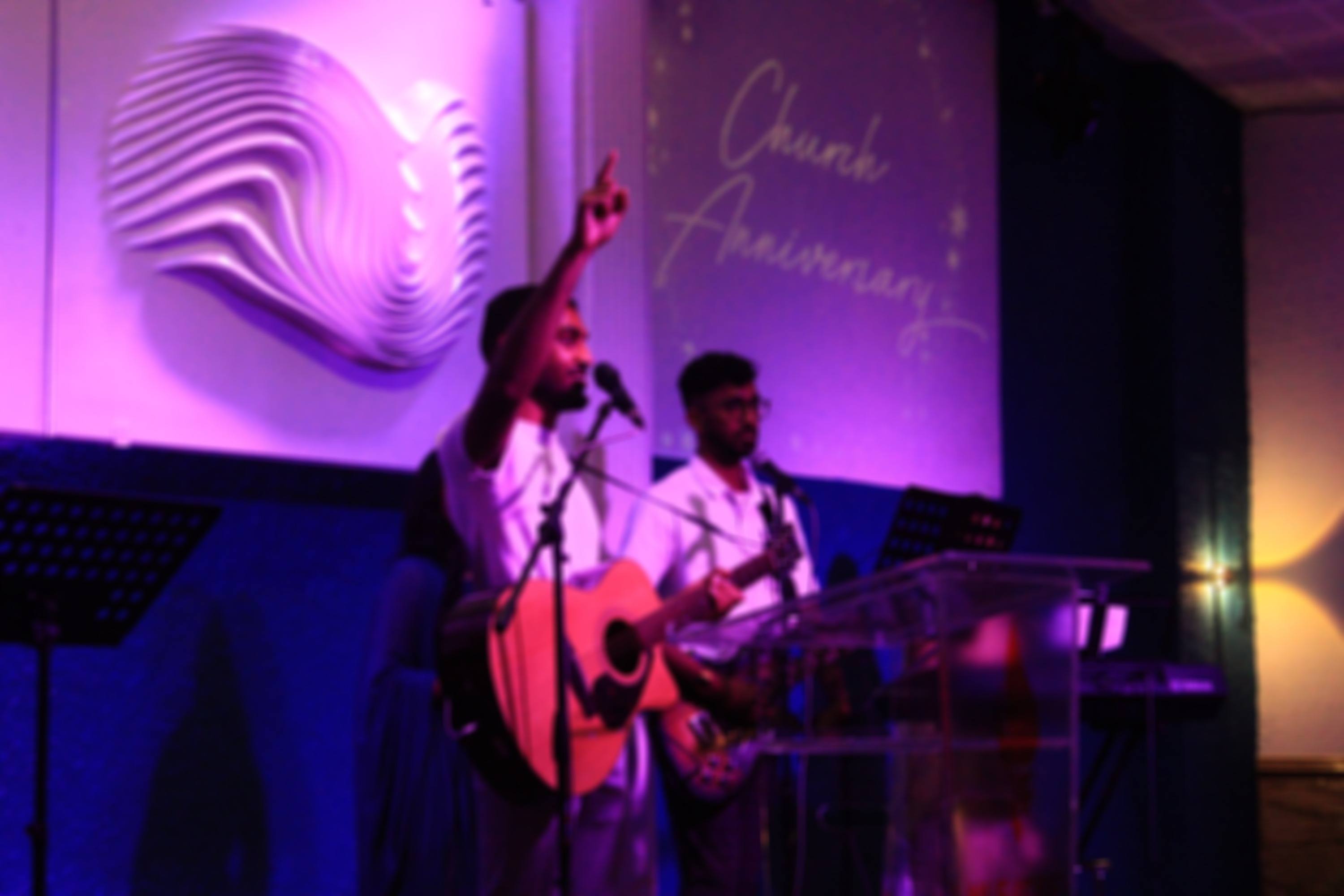 Worship band leading the English service